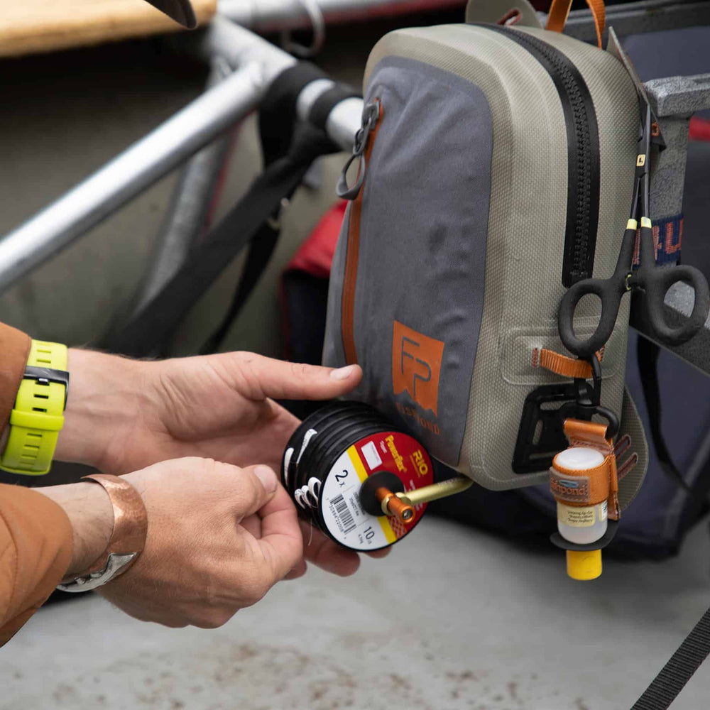 Clip attachment for vest or pack with Headgate