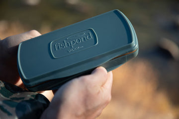 Outdoor use of Fishpond Pescador MagPad Fly Box in Smoke Grey