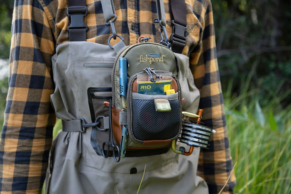 Close-up of zip-down fly bench with replaceable foam inside the chest pack.