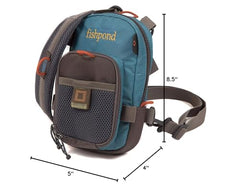 Zippered main compartment opened to show space for two fly boxes.