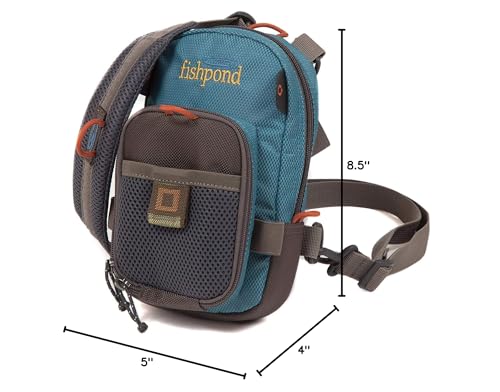 Fishpond San Juan vertical fly pack zippered compartment, secure fly box storage during knot-tying sessions.