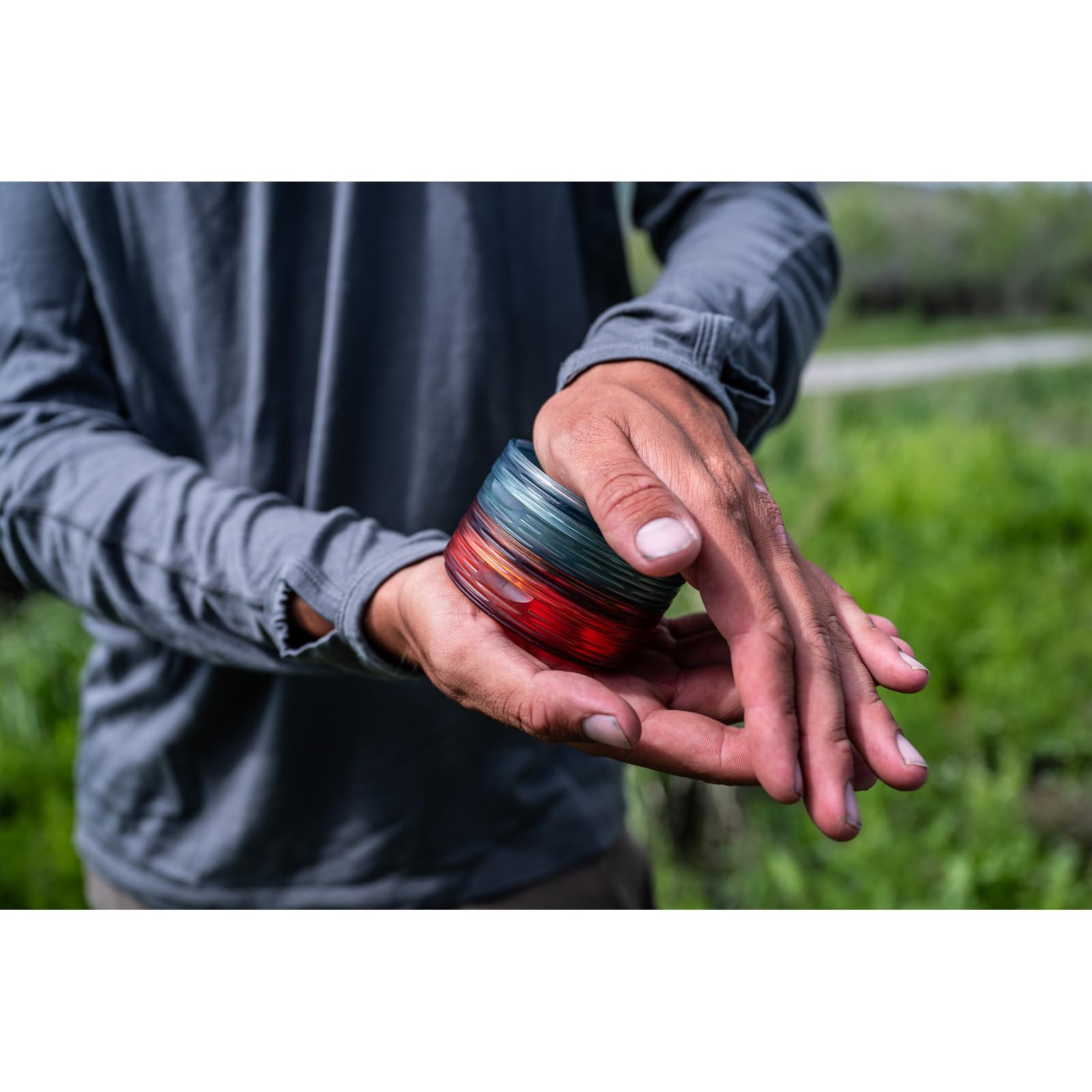 fishpond Shallow MagPad Fly Puck — compact TPU container with contents