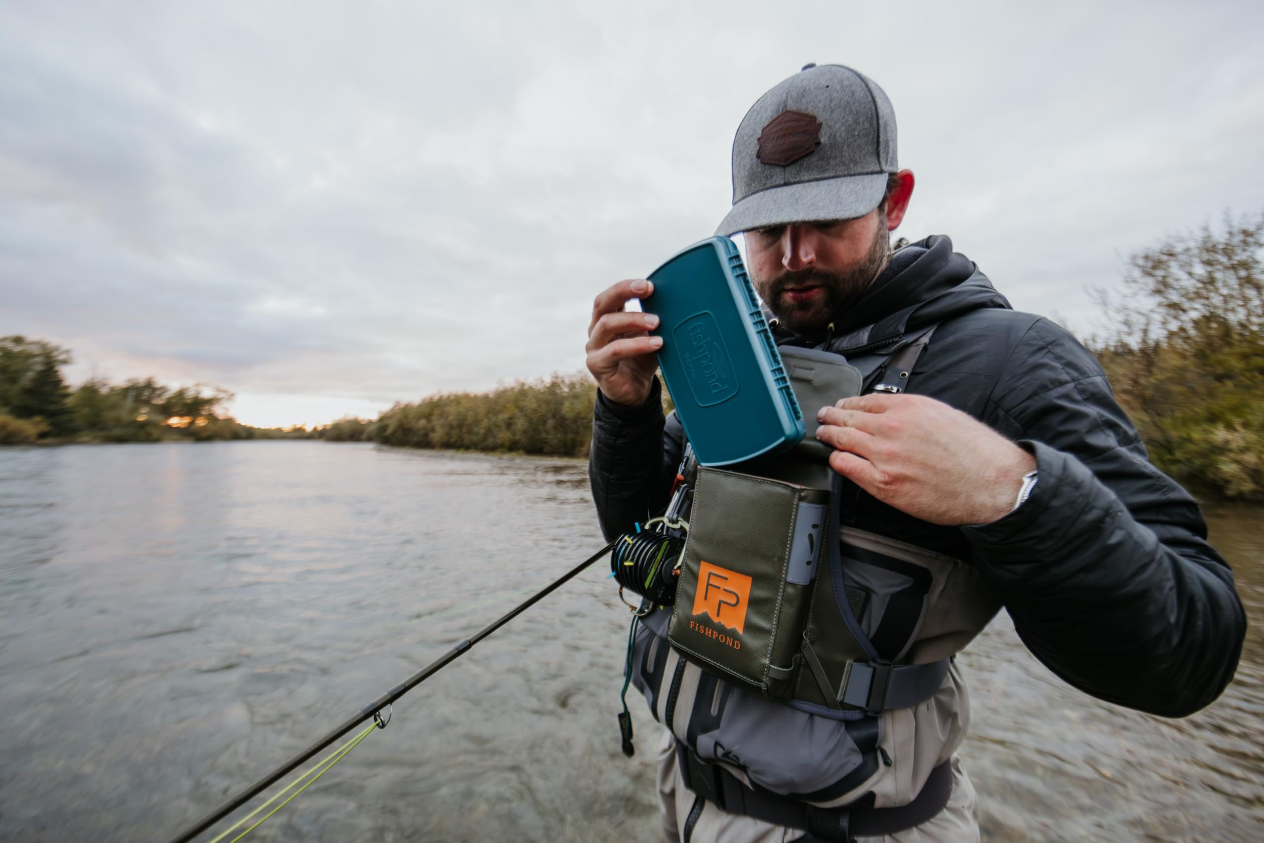 fishpond Stormshadow chest pack close-up highlights waterproof TRUZip pocket.