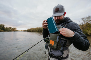 fishpond Stormshadow chest pack close-up highlights waterproof TRUZip pocket.