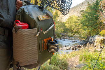 Ambidextrous net slot back panel with D-ring