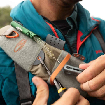 fishpond Summit 2.0 sling pack organization pockets keeping fly gear within reach on the river.