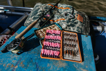 Two-compartment Burnt Orange Double Haul Fly Box showing separation for nymphs and dry flies