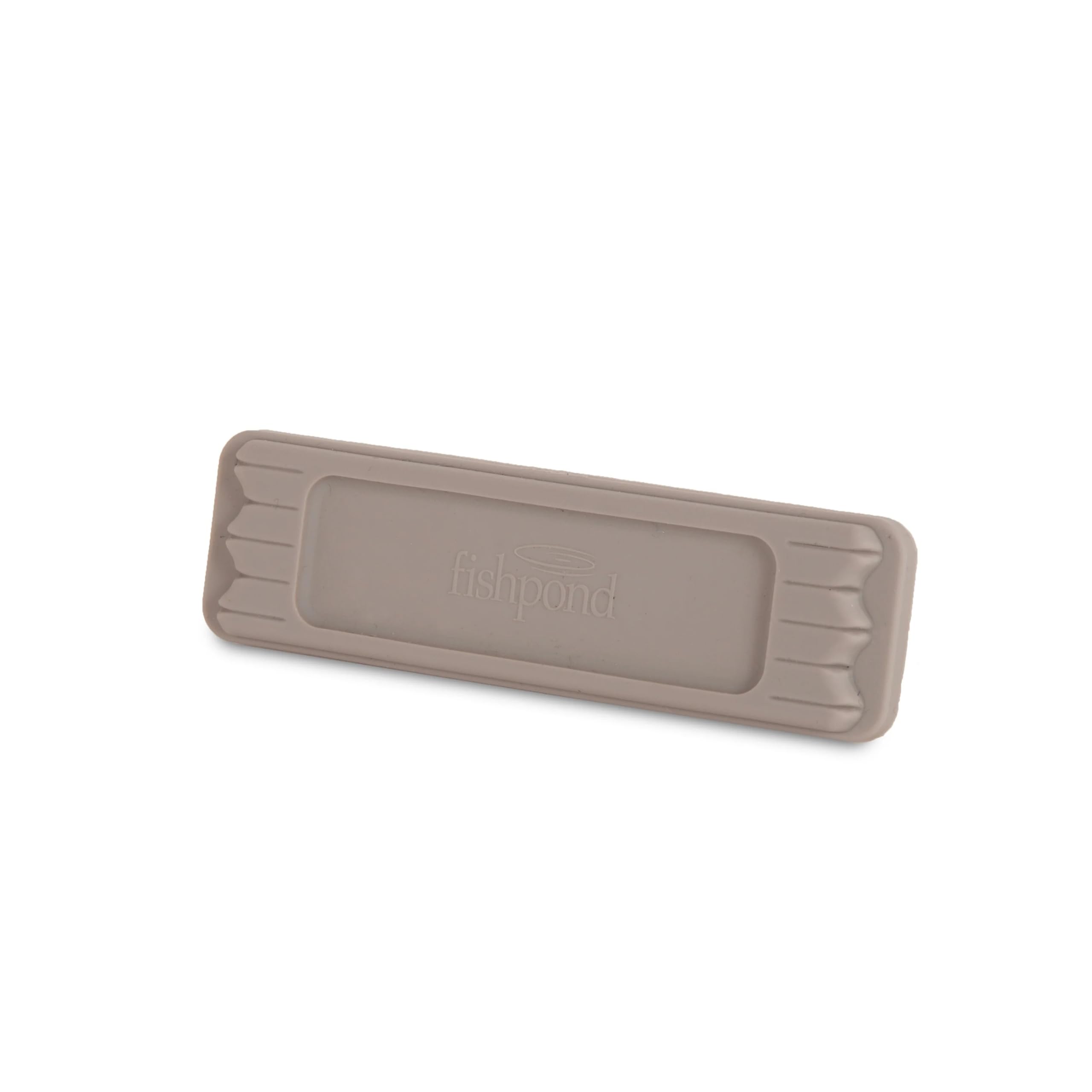 Fold-over Velcro strap securing MagPad to exterior patch