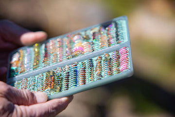 Fishpond Tacky Original 2X fly box side profile displaying slim, durable design.