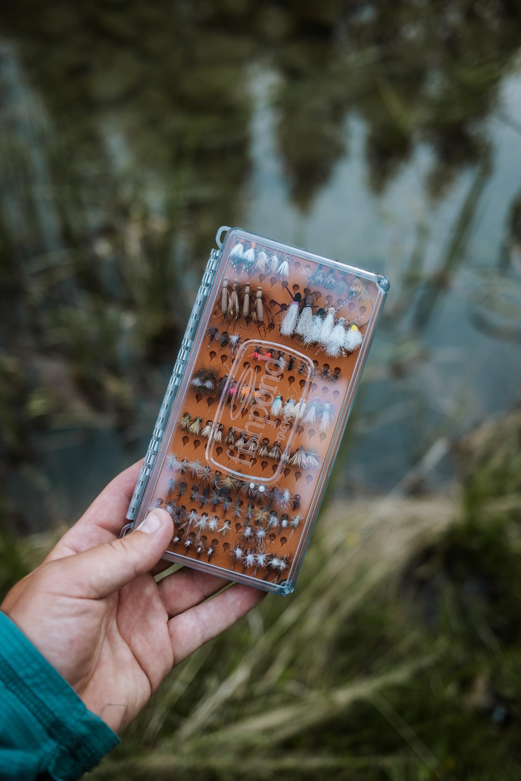 Side profile of Fishpond Tacky Original Fly Box highlighting slim footprint