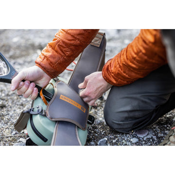 fishpond Thunderhead adjustable padded shoulder strap with tool attachment for quick access.