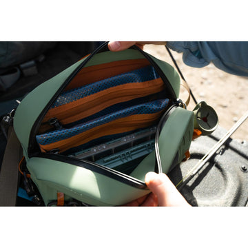 fishpond Thunderhead interior includes removable zippered pouch for organized small items.