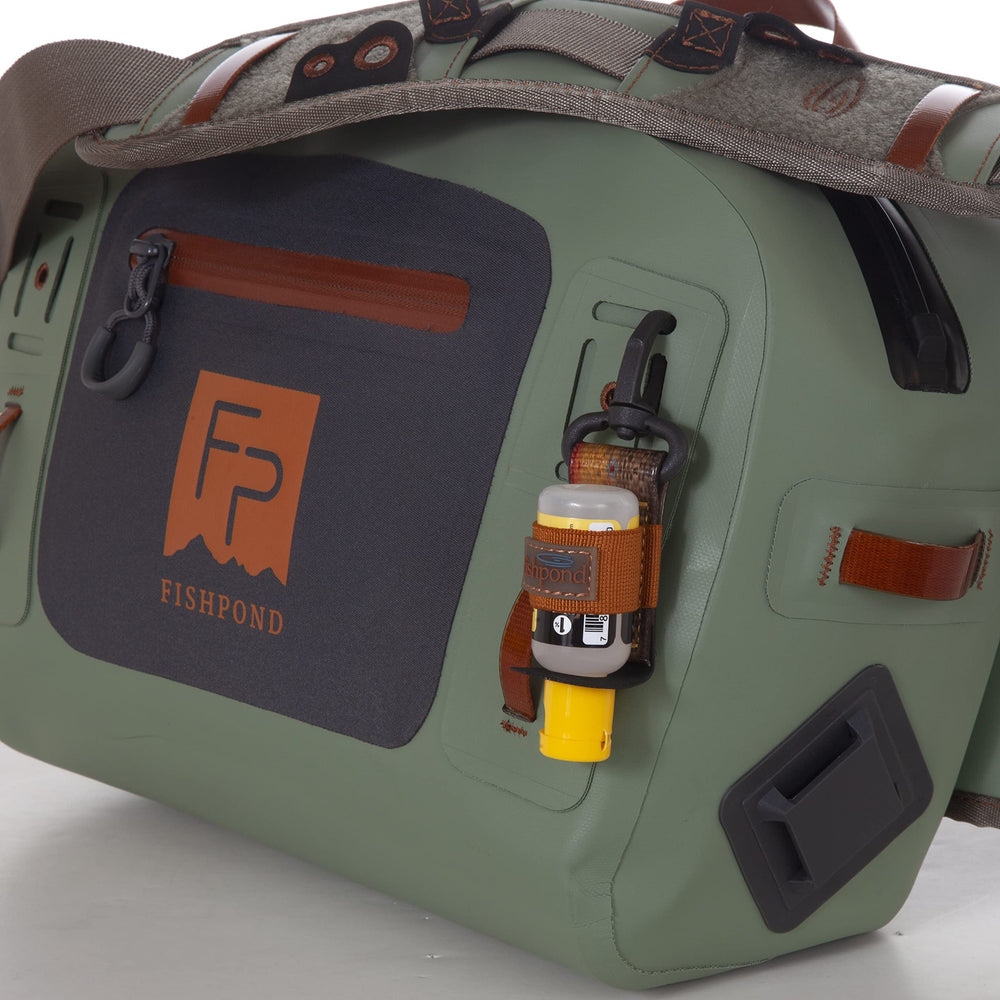 Fishpond Thunderhead Lumbar padded shoulder strap with tool attachments keeps gear handy