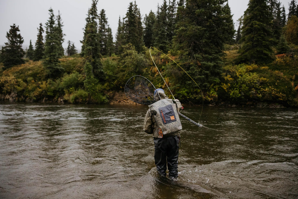 Fishpond Wind River Roll-Top Eco Shadowcast Camouflage keeps gear discreet on water