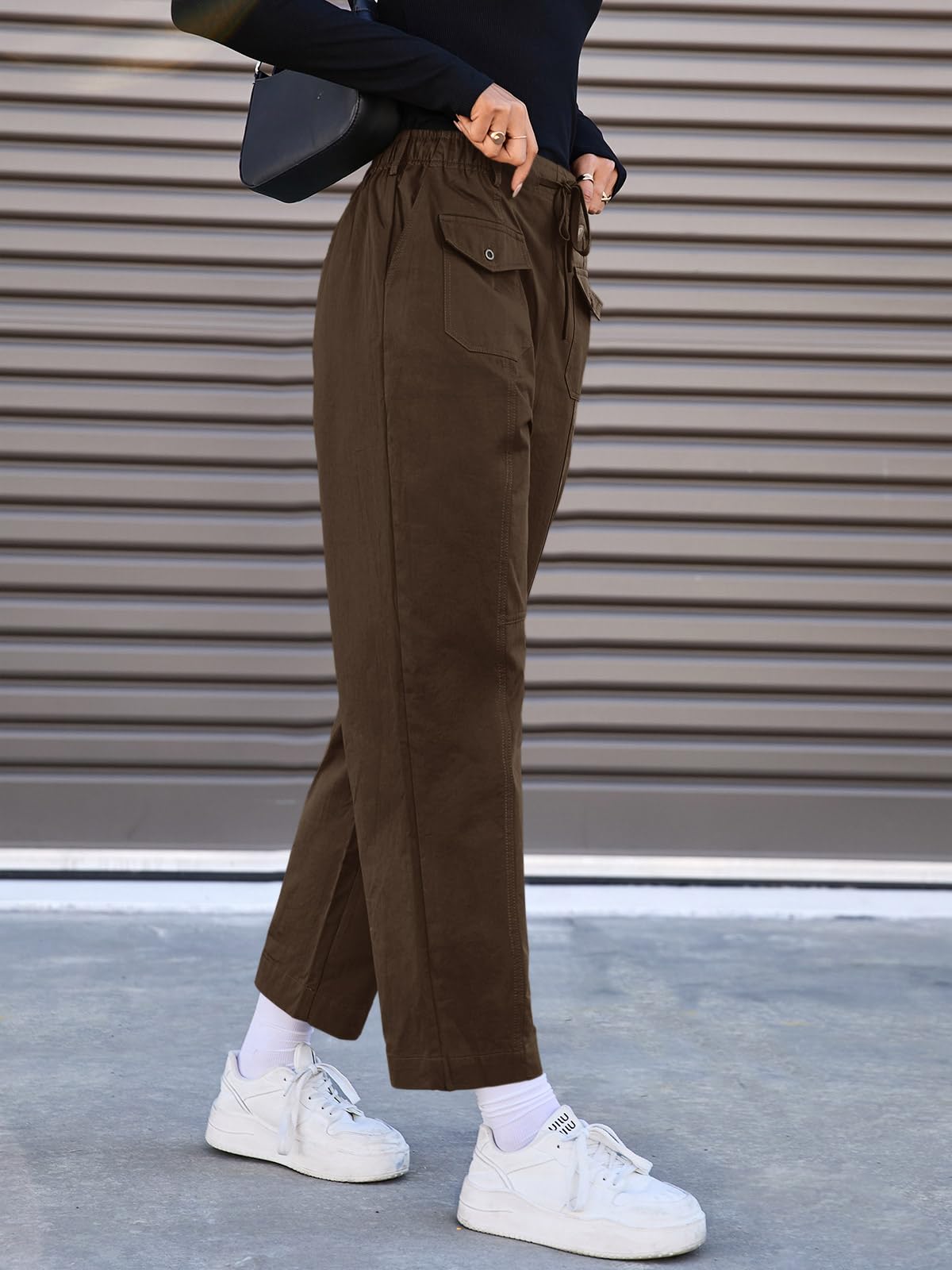 Fisoew cargo pants styled with fitted top and chunky sneakers for versatile looks.