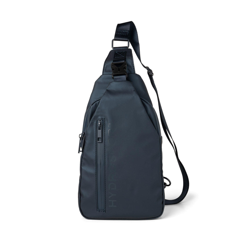 FITKICKS Hydrosport sling bag navy front view showing compact travel-ready design