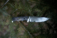 Close-up of 169OT fixed blade with laminate wood handle