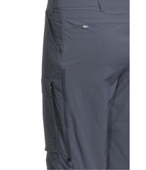 Fjällräven Abisko Hybrid Trail Trousers worn in forest scene demonstrating rugged fabric