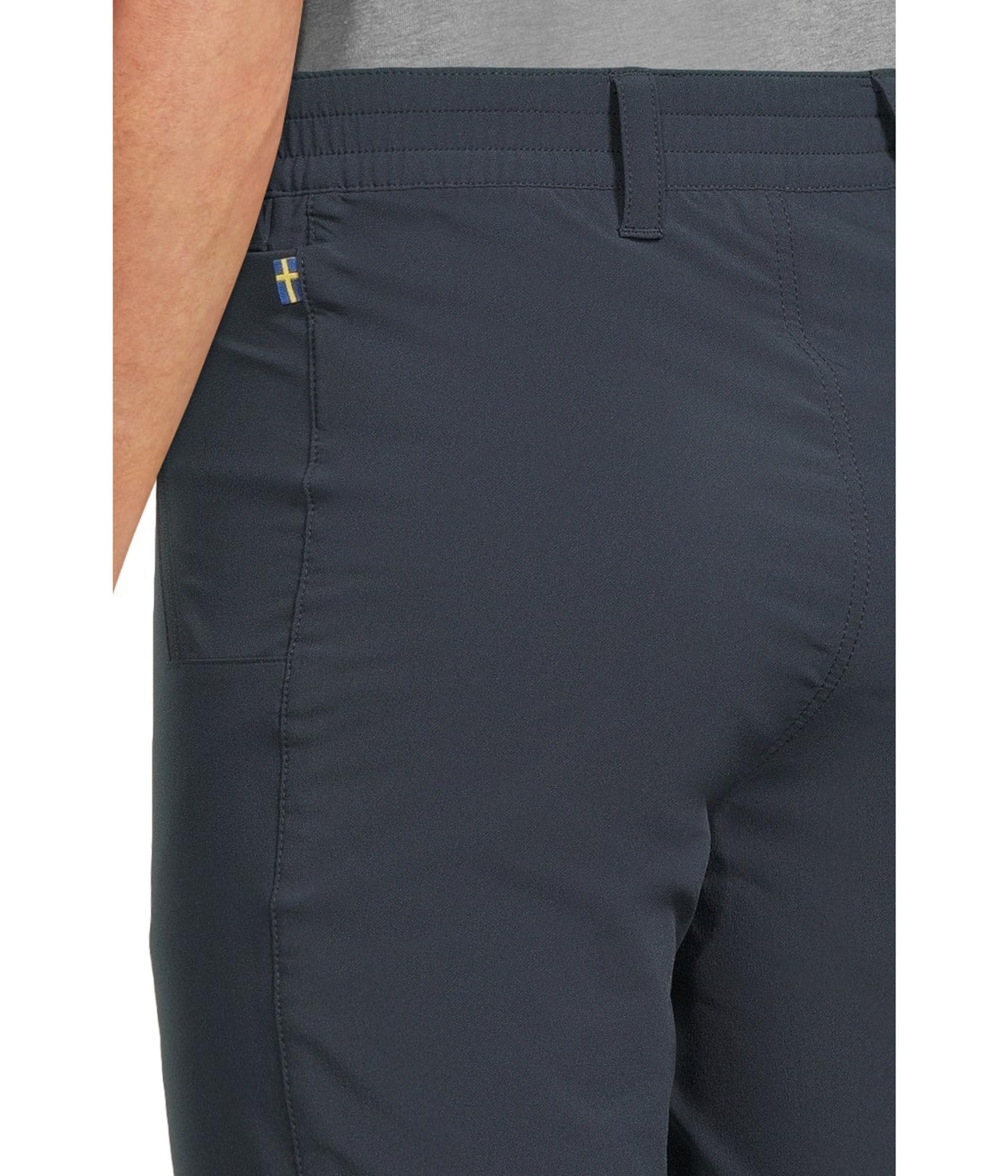 Fjällräven Abisko Trail Stretch Trousers back view emphasizing durable stretch fabric.