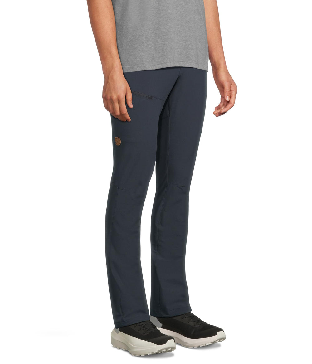 Fjällräven Abisko Trail Stretch Trousers side view showing mobility for active trekking.