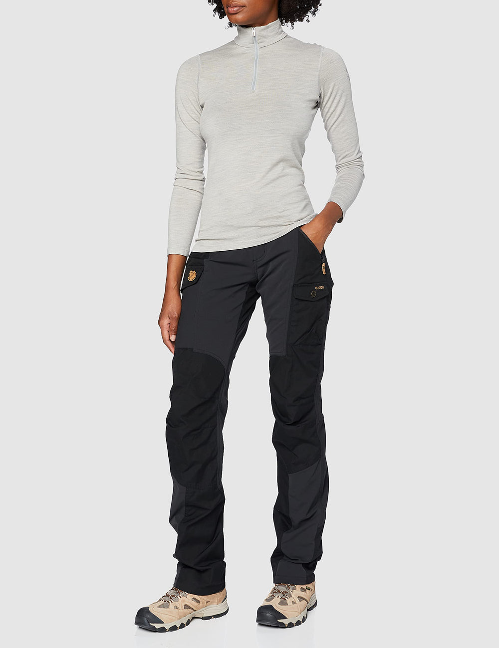 Fjällräven Nikka Curved Trousers black, side view highlighting mobility on trails.