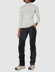 Fjällräven Nikka Curved Trousers black, side view highlighting mobility on trails.