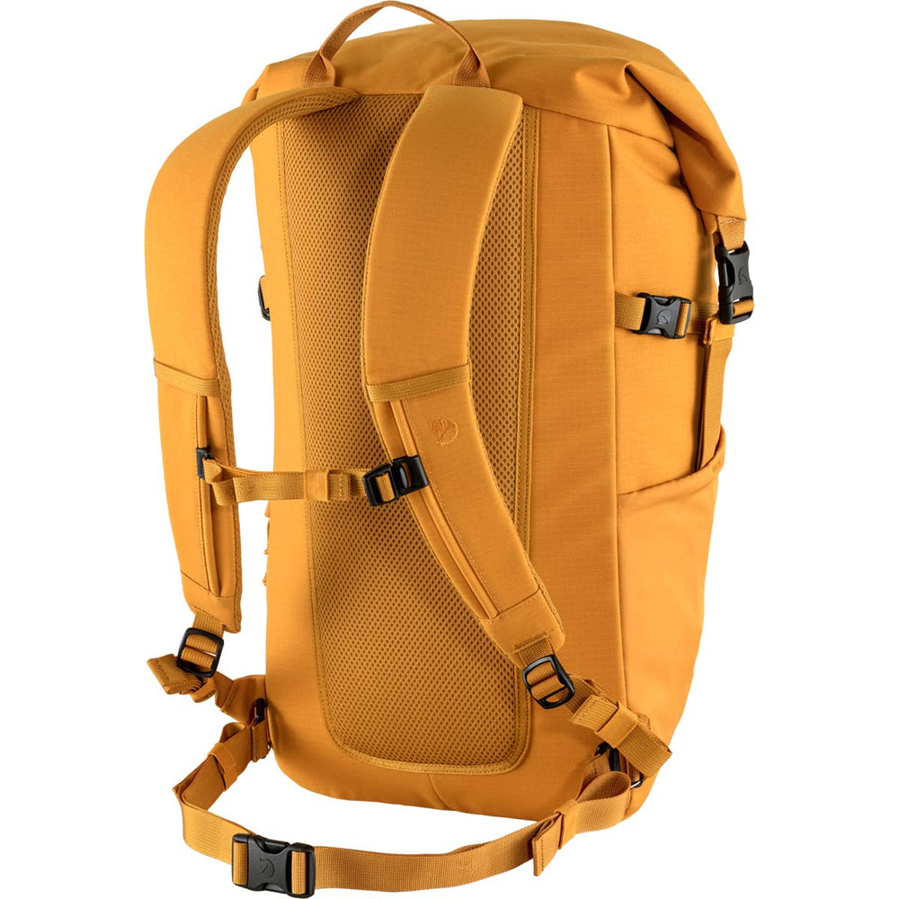 Fjällräven Ulvö Rolltop 30 side pocket in red gold demonstrates quick-access storage for essentials.