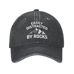 FLALORI Easily Distracted By Rocks Hat front view in black, soft and breathable everyday cap.