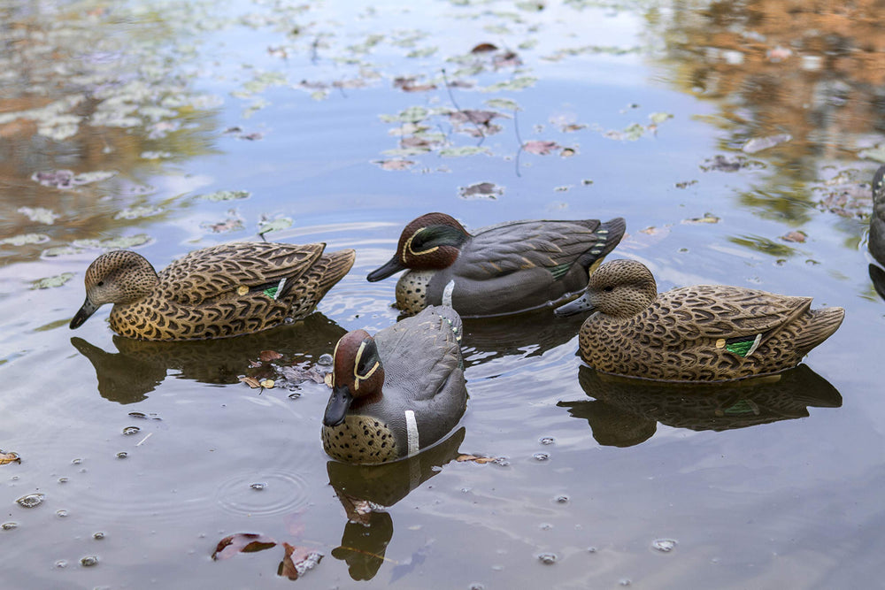 Flambeau Outdoors 8015SUV teal decoy spread on water for immersive setup.