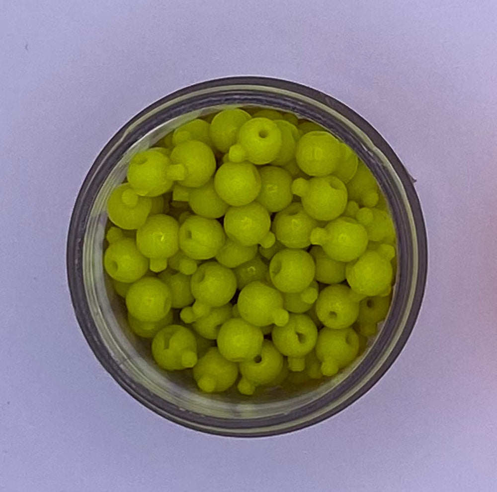 Chartreuse Smelly Smax bait balls designed to attract trout and panfish