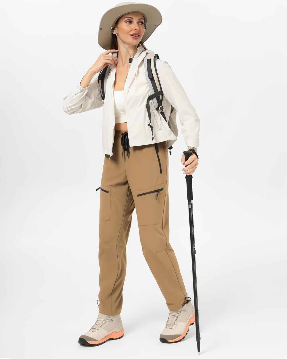 FLEFRM womens tall hiking pants water-resistant-texture close-up highlights rain-ready outer layer.