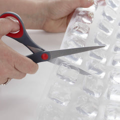 FlexiFreeze Ice Sheets inside a cooler to chill beverages during a picnic.