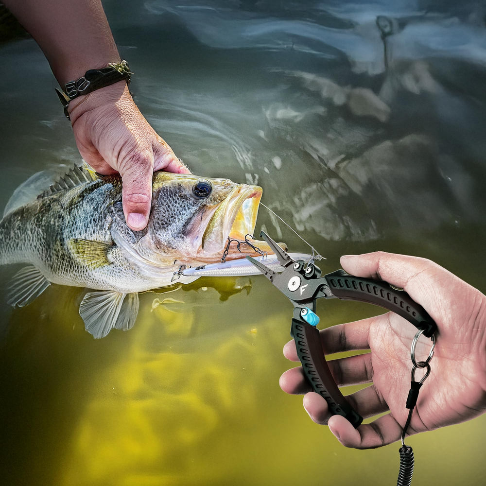 Saltwater fishing pliers close-up showing safety lock