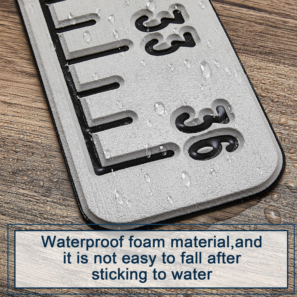 Gray foam fish ruler mounted on a boat deck