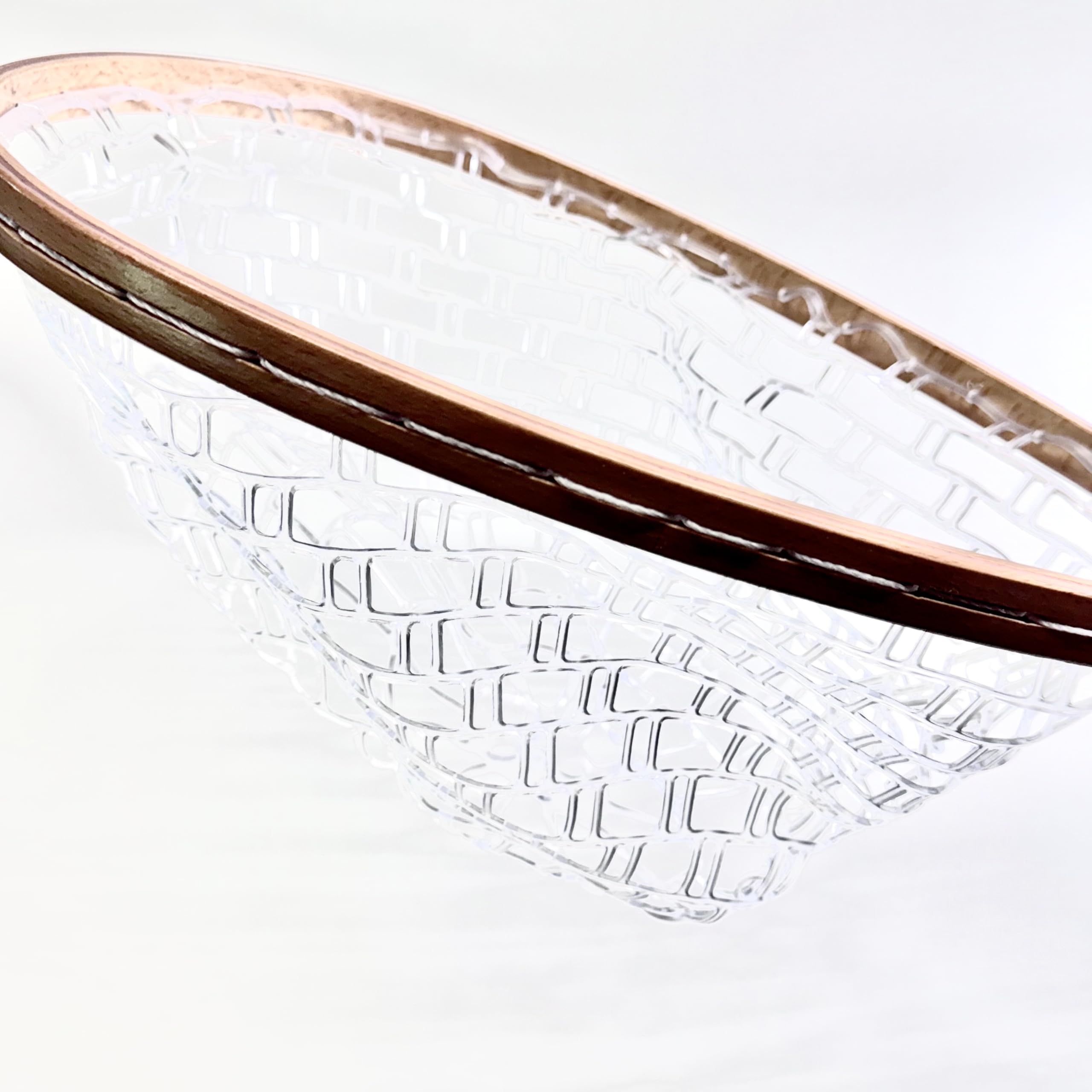 Landing net being used from a kayak