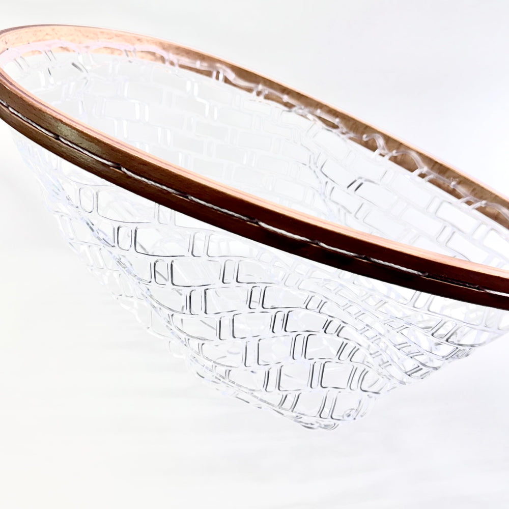 Landing net being used from a kayak