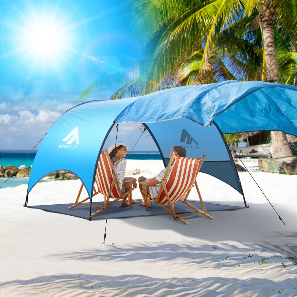 Flycoop Beach Tent ground stakes keep the shade secure.