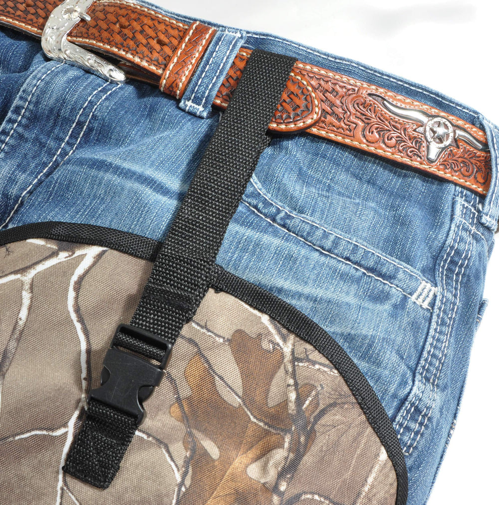 Foreverlast Snake Guard Chaps worn over boots with adjustable straps for quick on-off.