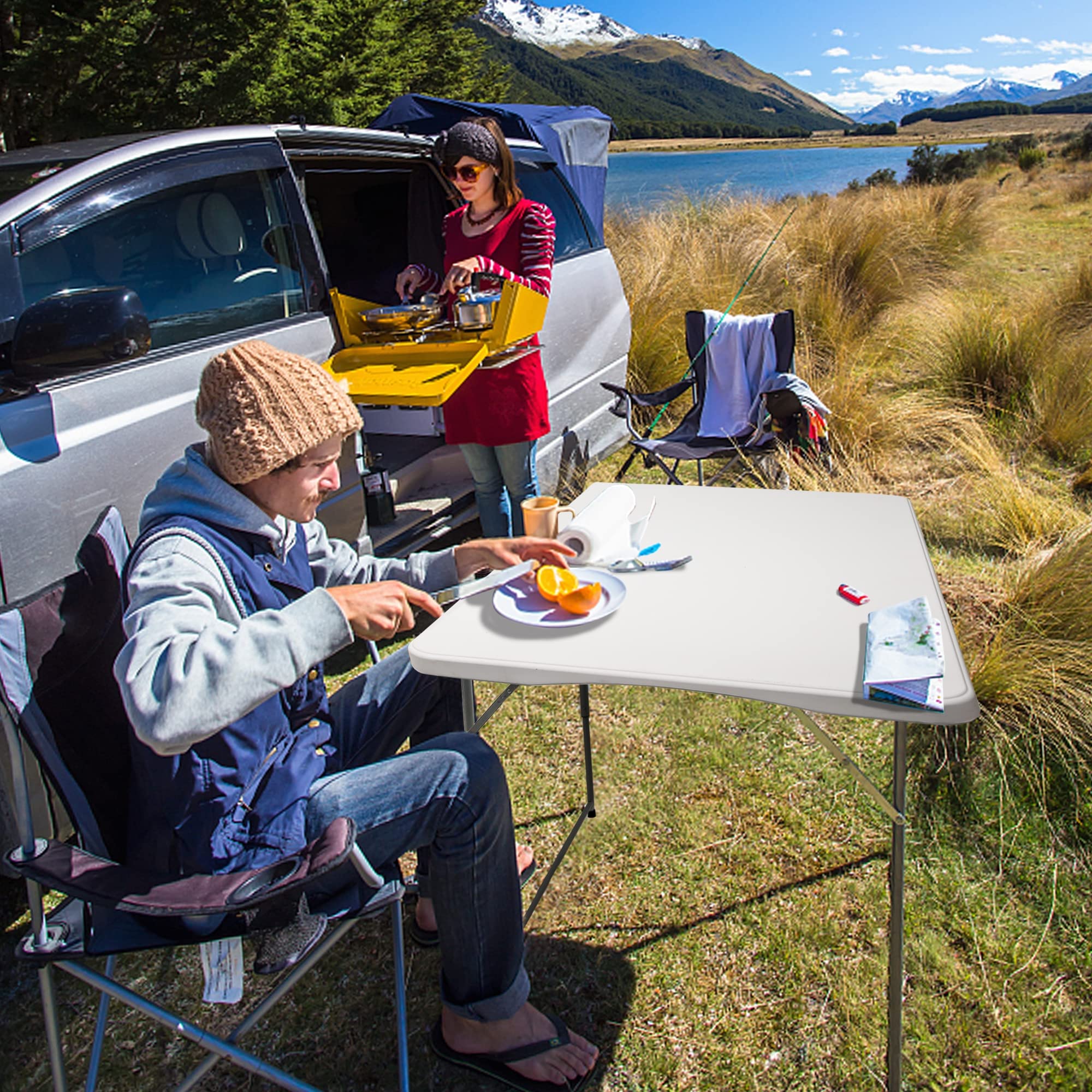 FORUP folding utility table folded compact for easy storage and portability.