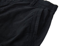 FOURSTEEDS cargo pants cargo pockets with flap and metal buttons.