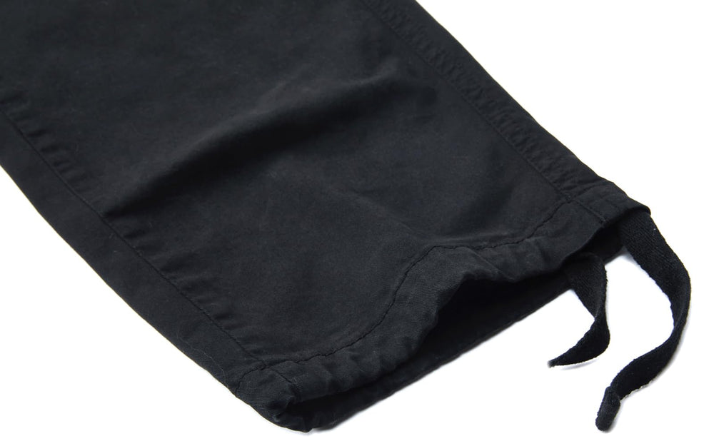 FOURSTEEDS fabric texture highlighting soft breathable cotton-spandex blend.
