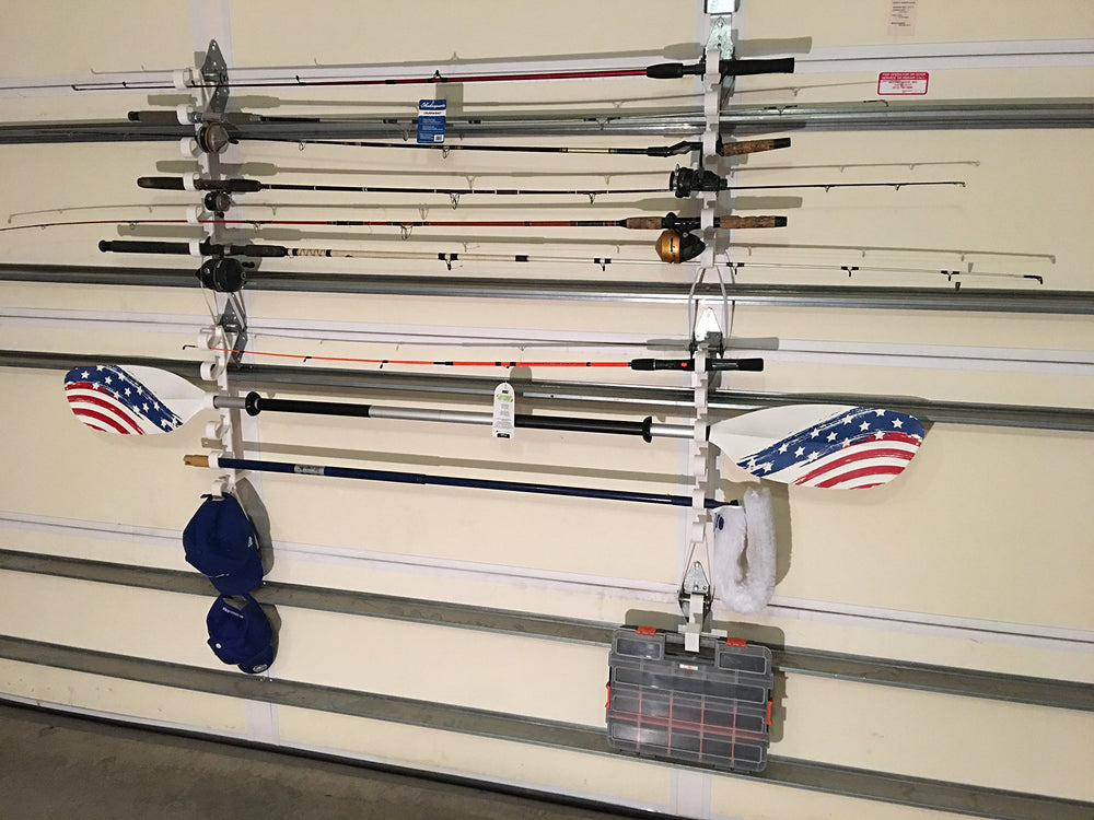 Fourth Wall Solutions garage door storage rack mounted on a garage door