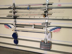 Fourth Wall Solutions garage door storage rack mounted on a garage door