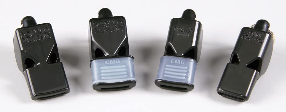 Fox 40 mini whistle with lanyard attached, ready for quick access in crowded sports settings.