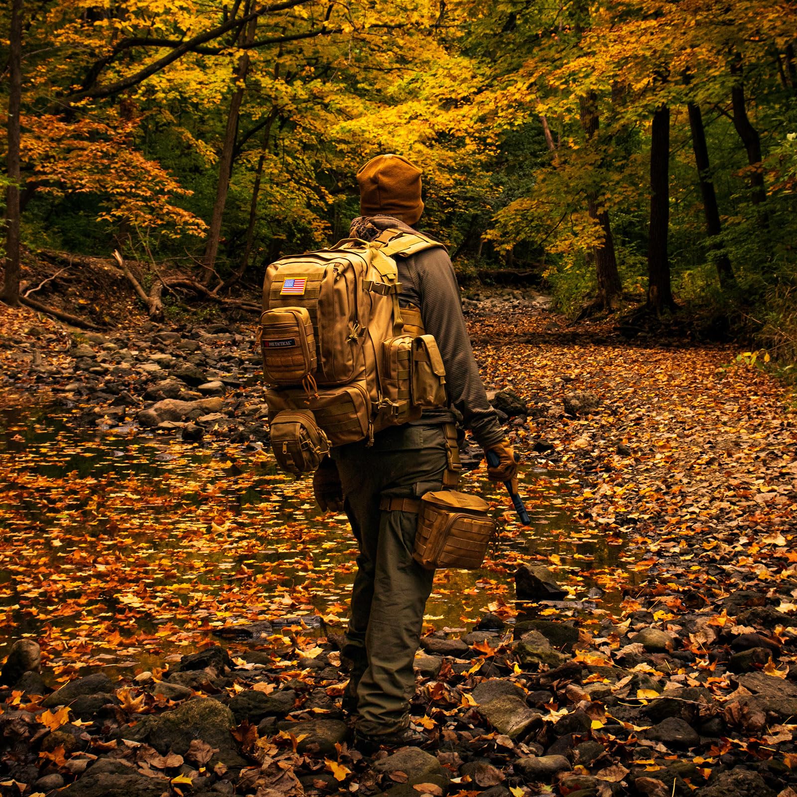 Fox Outdoor Products Advanced 3-Day Combat Pack bottom pocket keeps tools secure on rugged treks.
