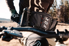 Fox Racing Lumbar Hydration Pack opened to reveal organized 2L main pocket.