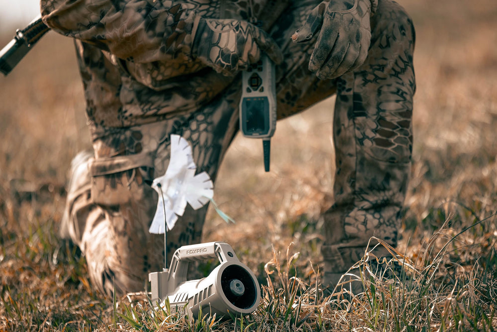 FOXPRO Hellcat Pro TX-1000 remote with backlit display