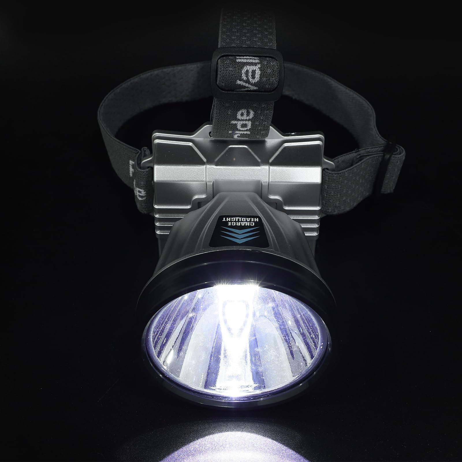 FOYTOKI LED Headlamp used for night work setup with broad lighting.
