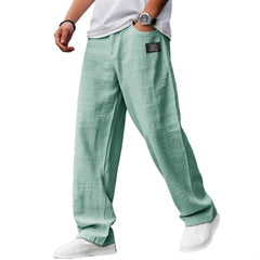 FQZWONG Mokaloha pants in black, embroidery logo detail and relaxed fit for all-day comfort.