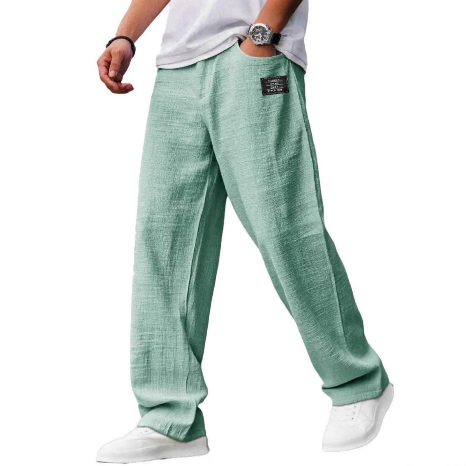 FQZWONG Mokaloha pants in black, front view highlighting deep pockets for essentials.